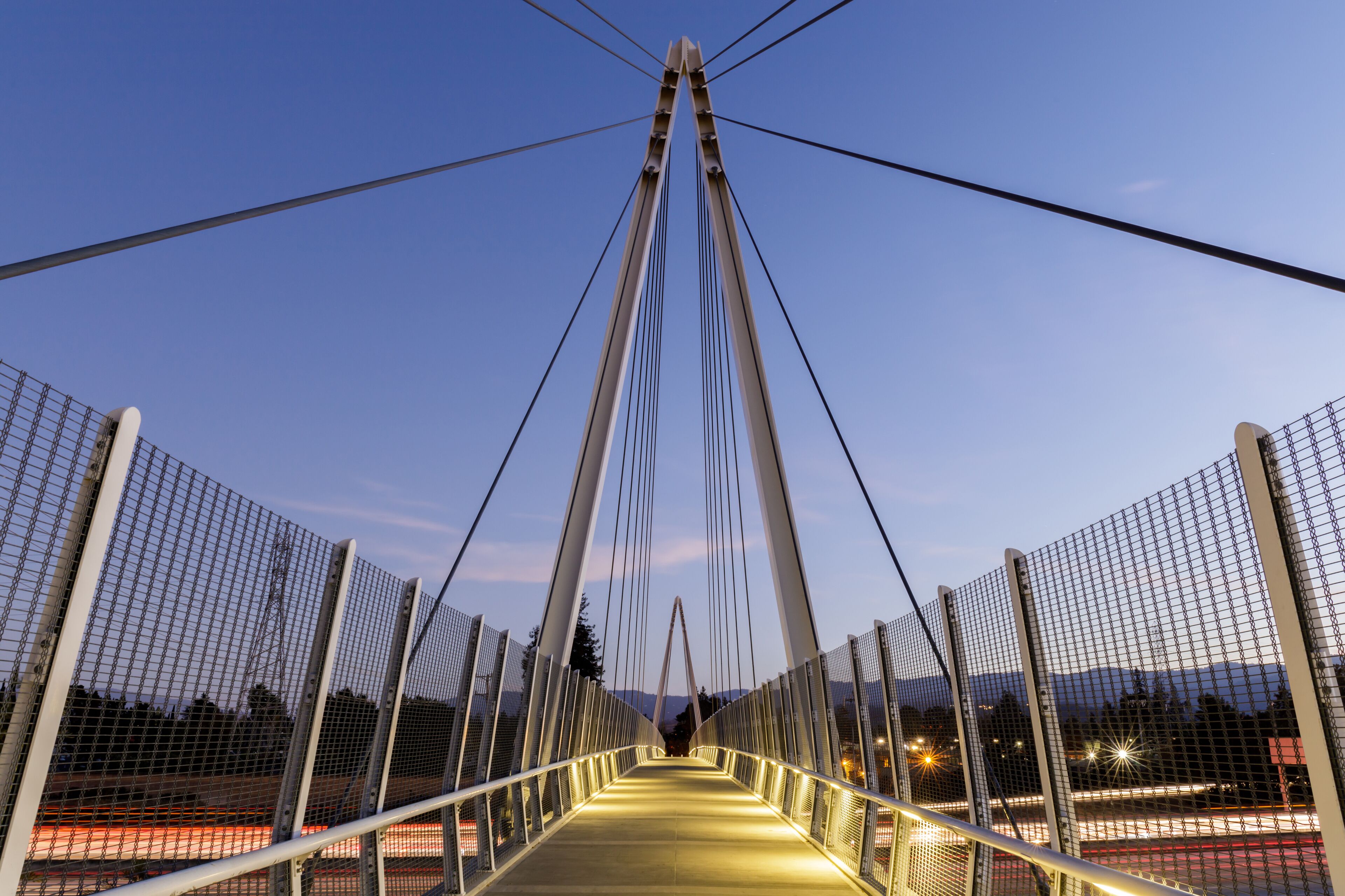 Dusk over Don Burnett Bicycle-Pedestrian Bridge (aka Mary Avenue Bicycle Footbridge). Cupertino, Santa Clara County, California, USA.