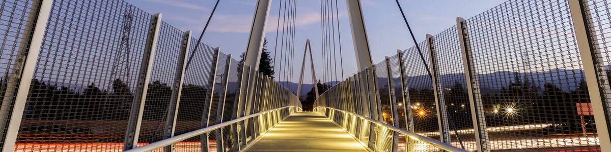 Dusk over Don Burnett Bicycle-Pedestrian Bridge (aka Mary Avenue Bicycle Footbridge). Cupertino, Santa Clara County, California, USA.