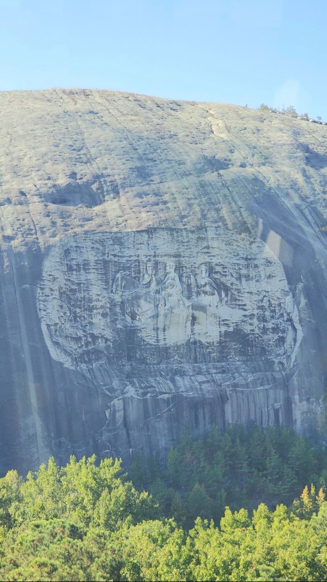 We ride the cable car to get to the top