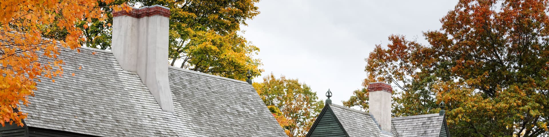 The back side of the Saugus Iron Works House in fall colors