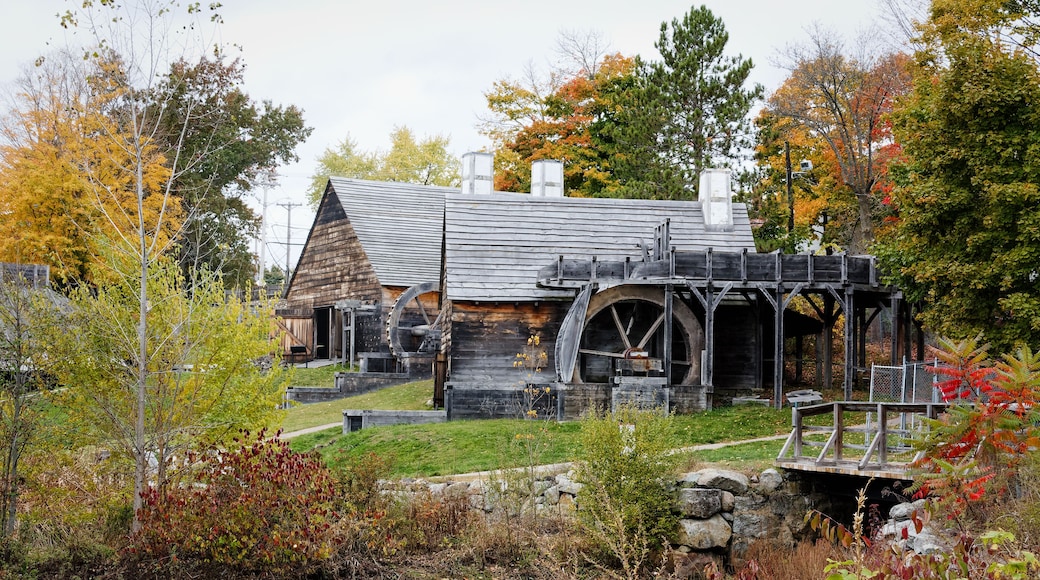 The Saugus Iron Works Forge and Slitting Mill surrounded by colorful fall foliage - landscape