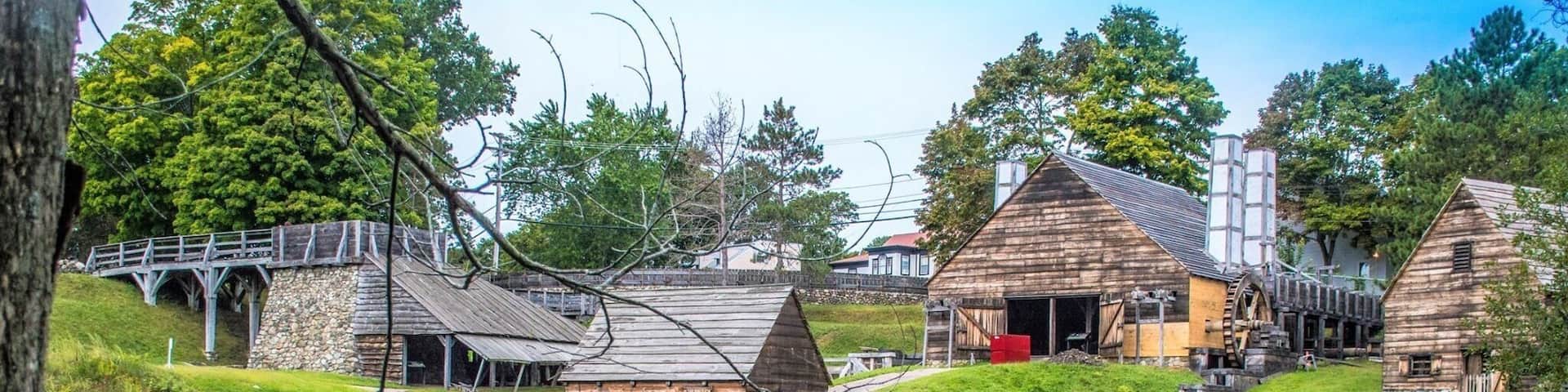 Saugus Iron Works National Historic Site, where European iron makers integrated into America, includes water wheels, hot forges, mills, and a 17th century home.