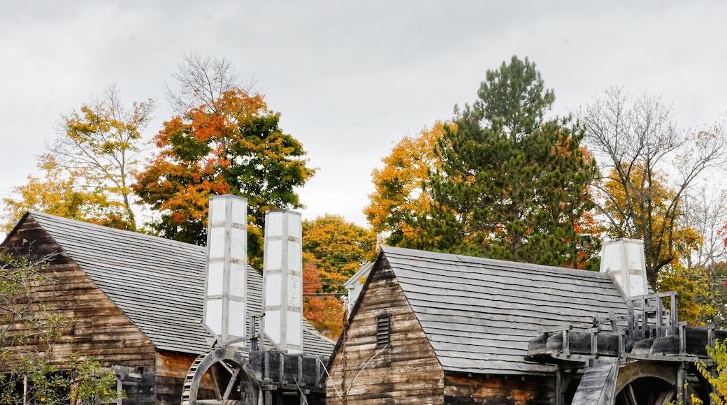 The Saugus Iron Works Forge and Slitting Mill surrounded by colorful fall foliage