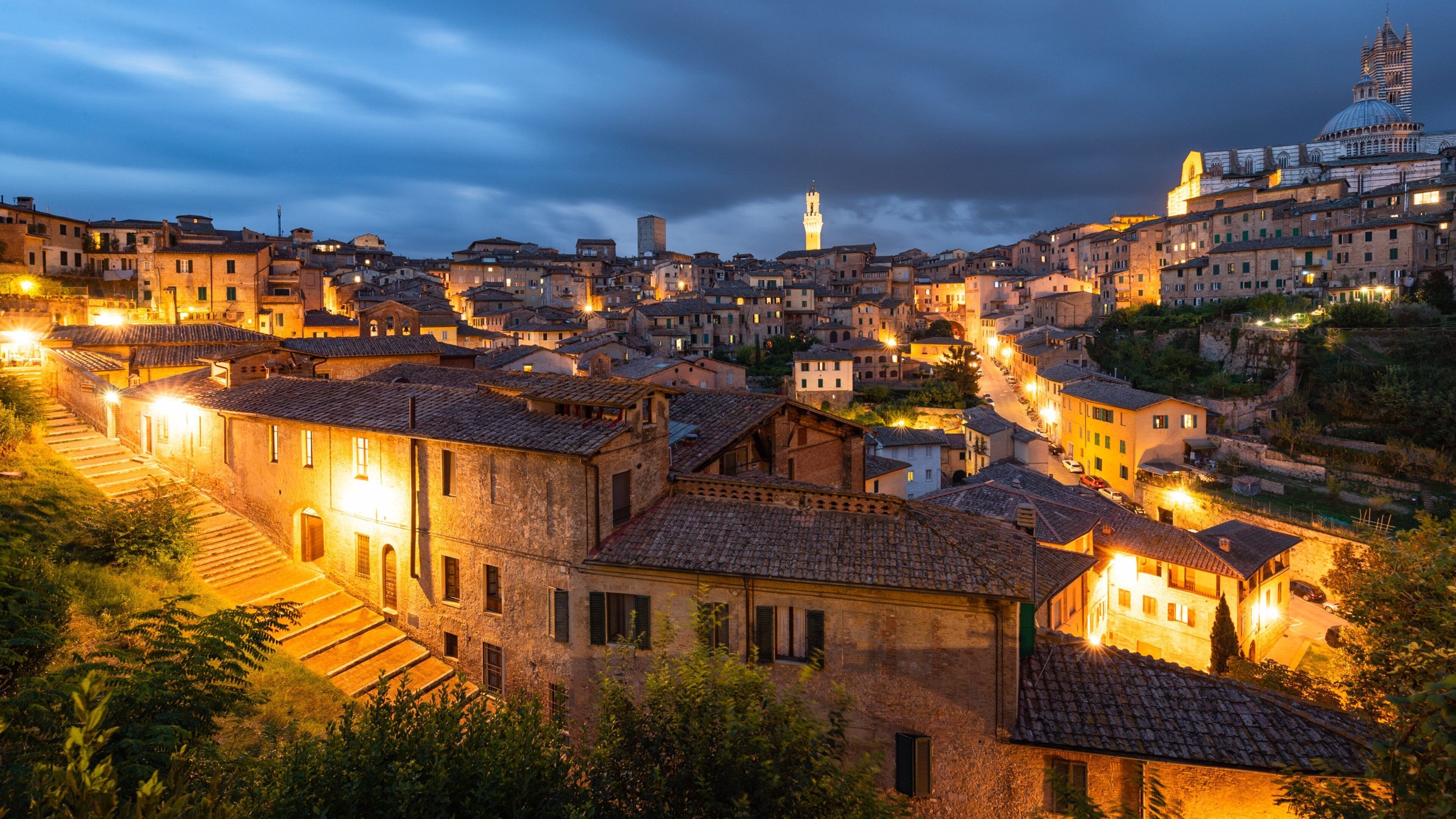 Siena showing landscape views, a city and night scenes