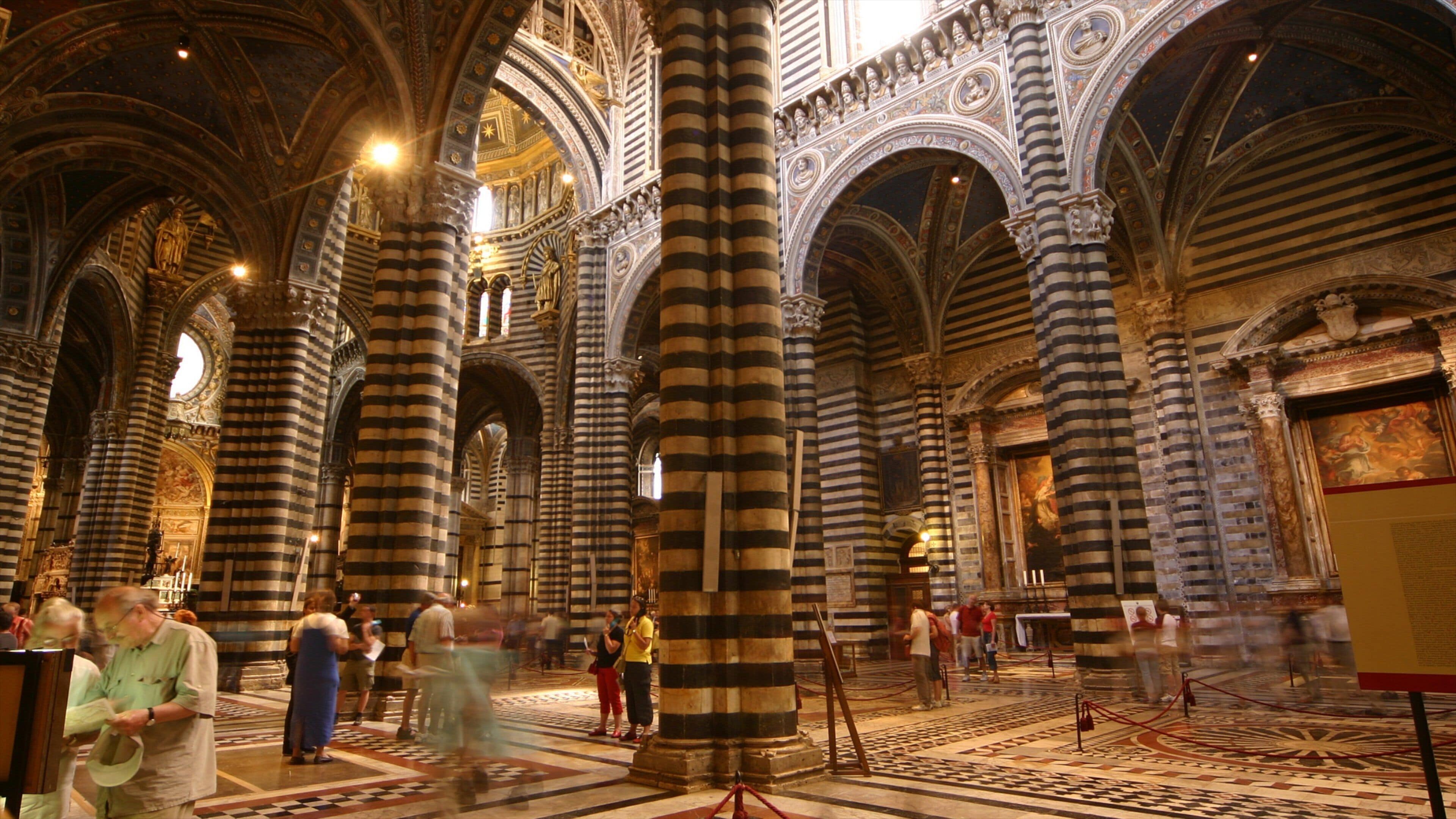 Siena featuring interior views, a church or cathedral and religious elements