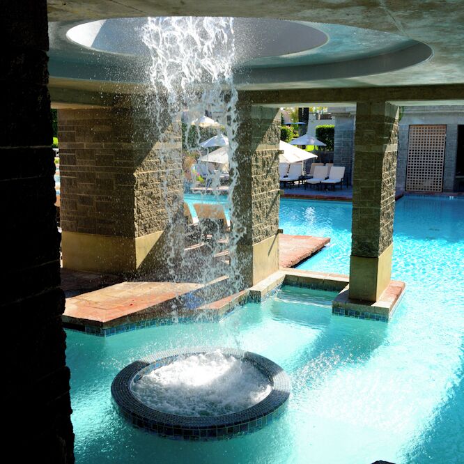 This is a shot of the waterfall Jacuzzi
at the 27 acre resort  HYATT REGENCY SCOTTSDALE RESORT AND SPA AT GAINEY RANCH.  It's a pretty nice place !