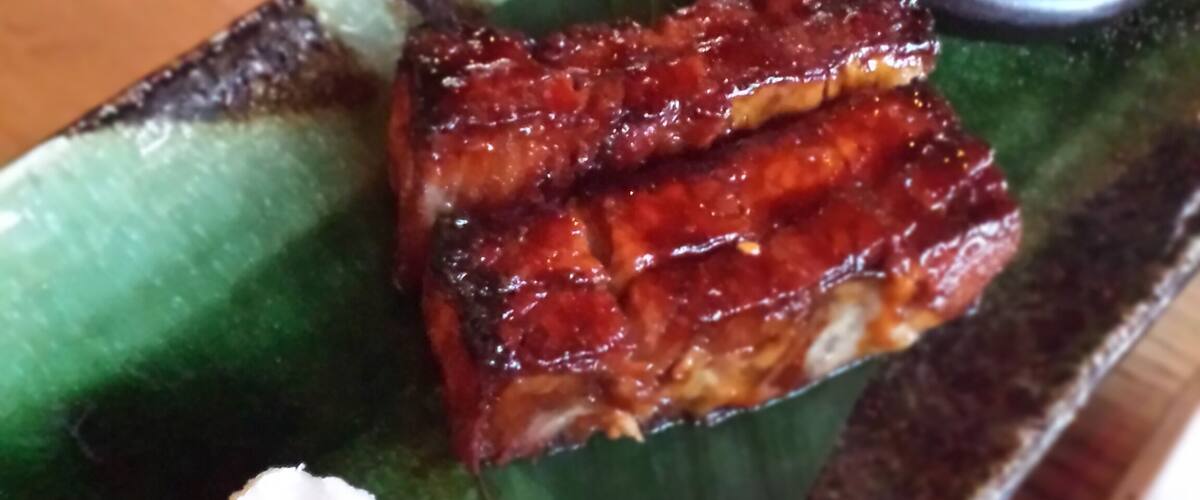 Fantastic happy hour menu! Drink specials and great food items at a discount. They even do happy hour all night, every night, June through August to offset the slow season. 
This is the sesame glazed pork belly with baby beets, wasabi and horseradish. Delicious dish!