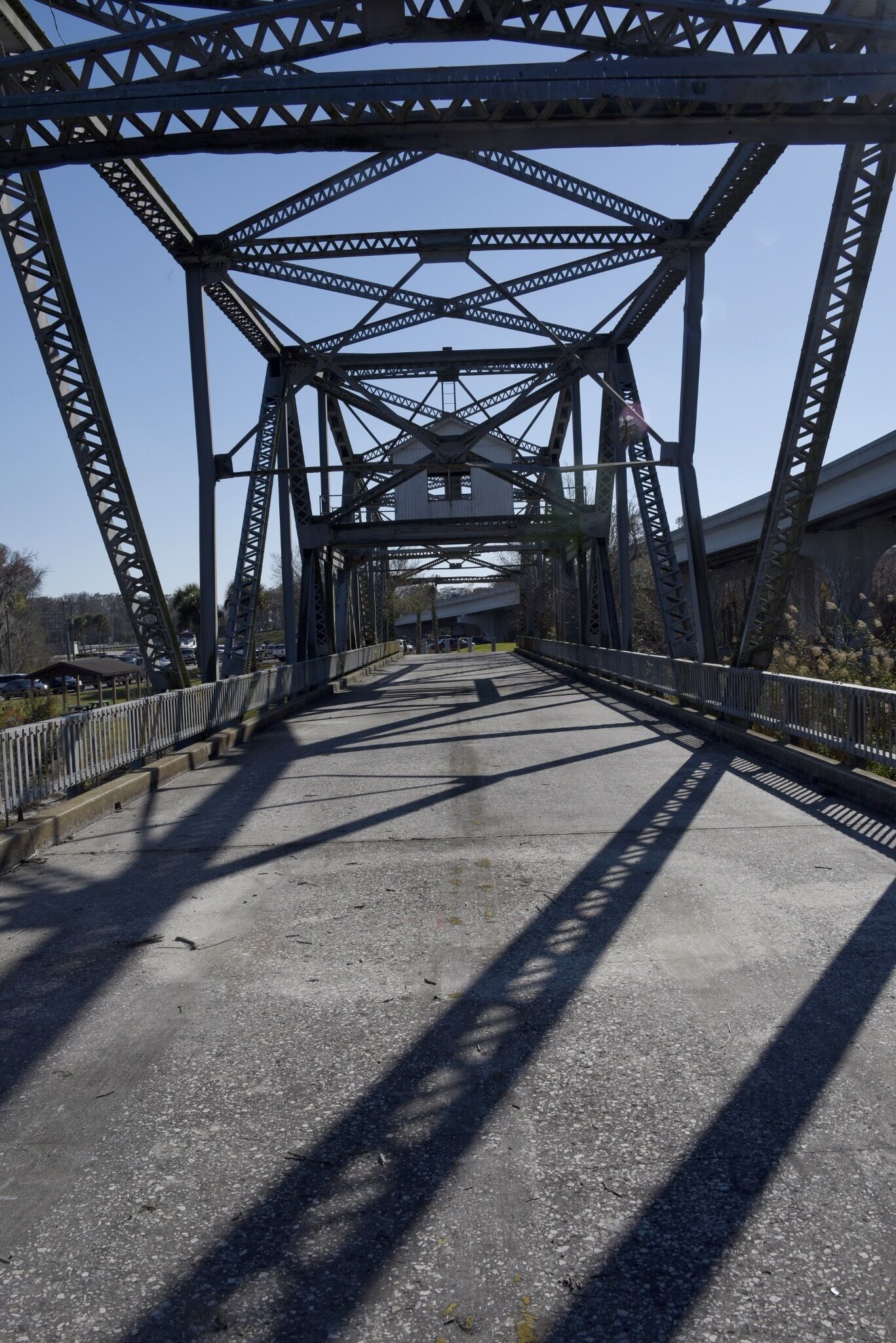 The park is mainly a boat launch, but the old 17-92 swing bridge is part of the park and makes an excellent spot to watch boats and wildlife. Boat traffic funnels under the railroad drawbridge next to the park. There's an osprey nest on the drawbridge and the birds have to move from one side of the nest to the other when the bridge goes up.