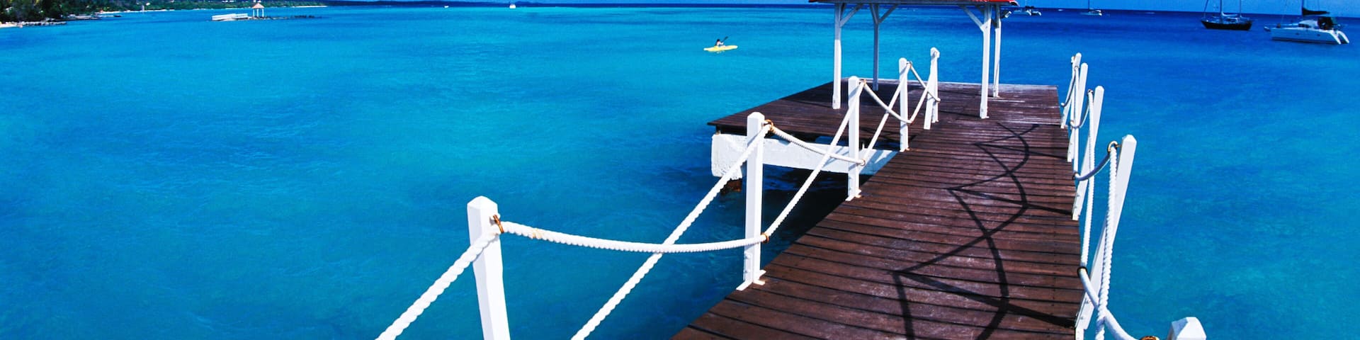 A93EBE Colorful graphic of dock in St Francois Guadeloupe