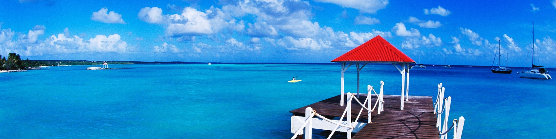 A93EBE Colorful graphic of dock in St Francois Guadeloupe