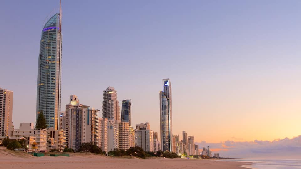 Surfers Paradise which includes a city, a beach and a sunset