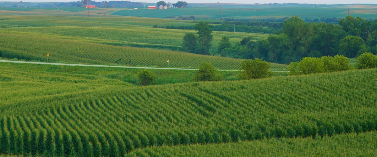 Dubuque which includes farmland, landscape views and a sunset