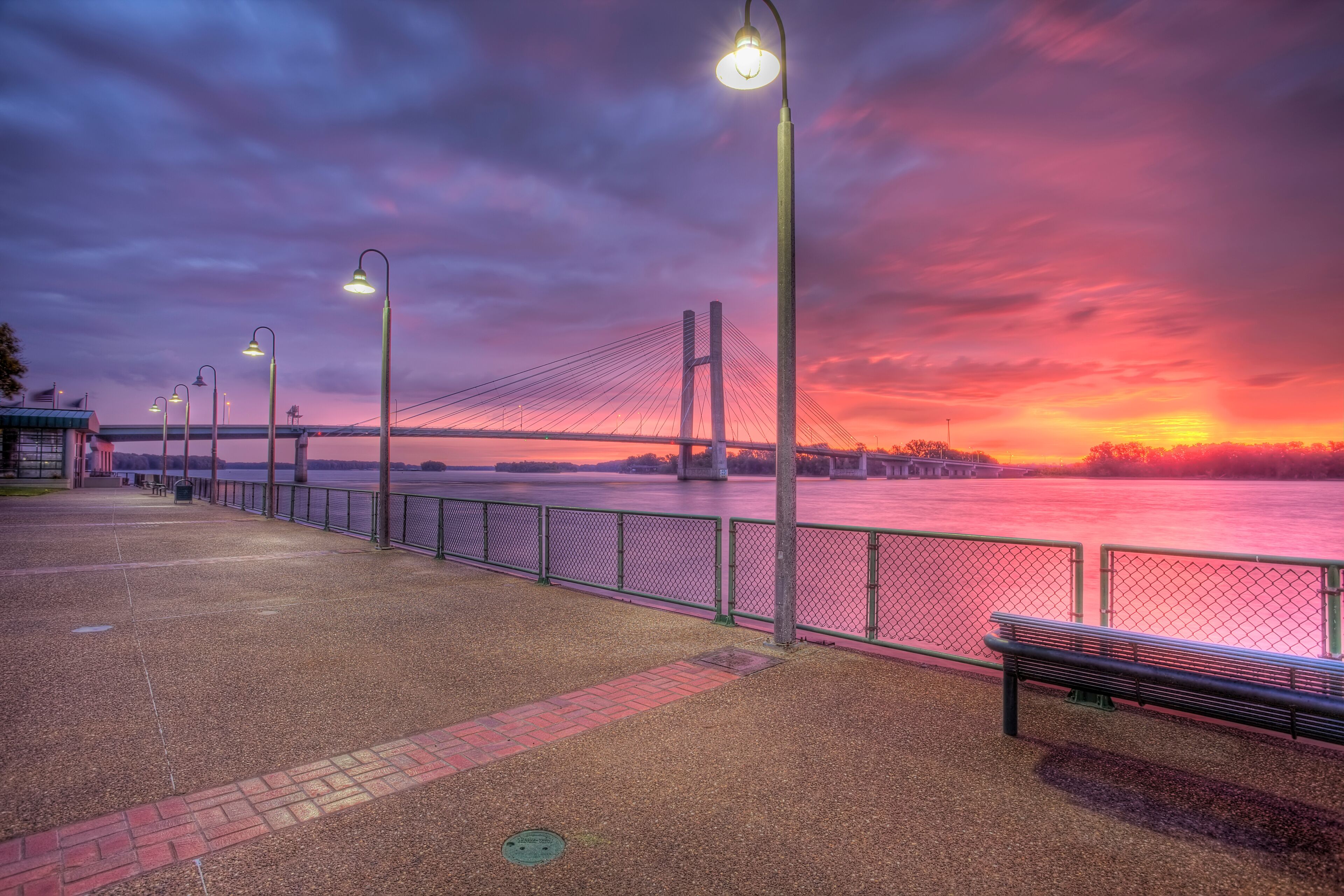HDR image of bridge over the Mississippi River at sunrise