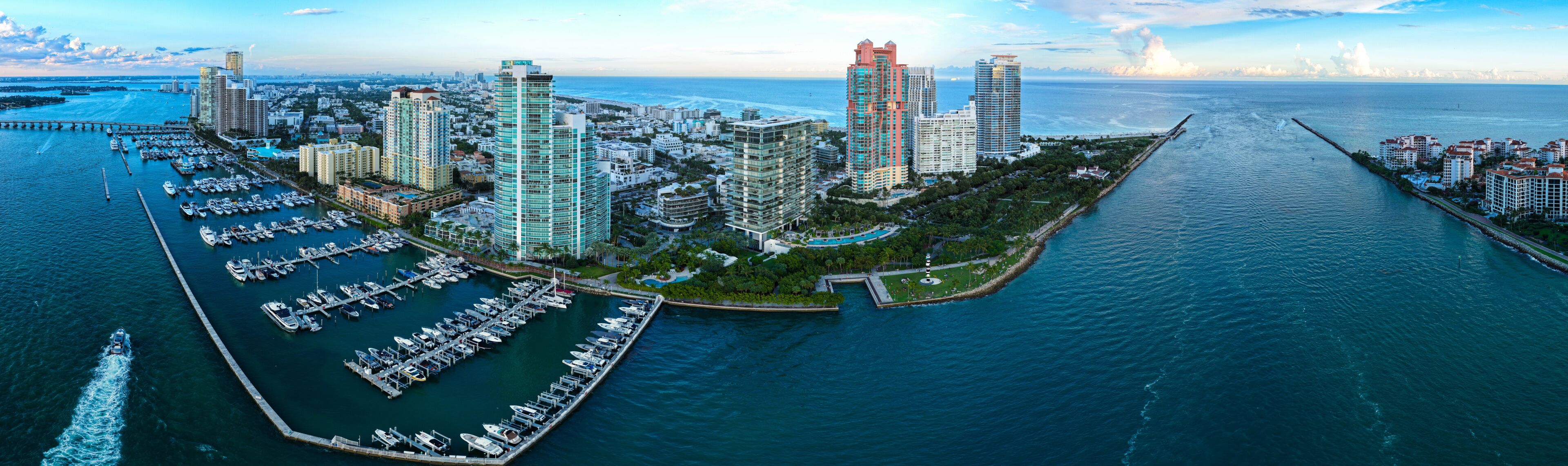 Luxury yacht. Miami south beach view. Travel destination. Marina in Miami, Florida. Biscayne bay. Docked vessels. Downtown Miami marina with luxury yacht. Summer vacation. Luxury South beach marina