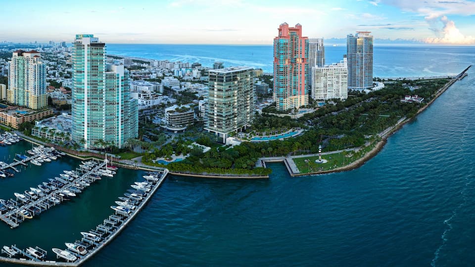 Luxury yacht. Miami south beach view. Travel destination. Marina in Miami, Florida. Biscayne bay. Docked vessels. Downtown Miami marina with luxury yacht. Summer vacation. Luxury South beach marina