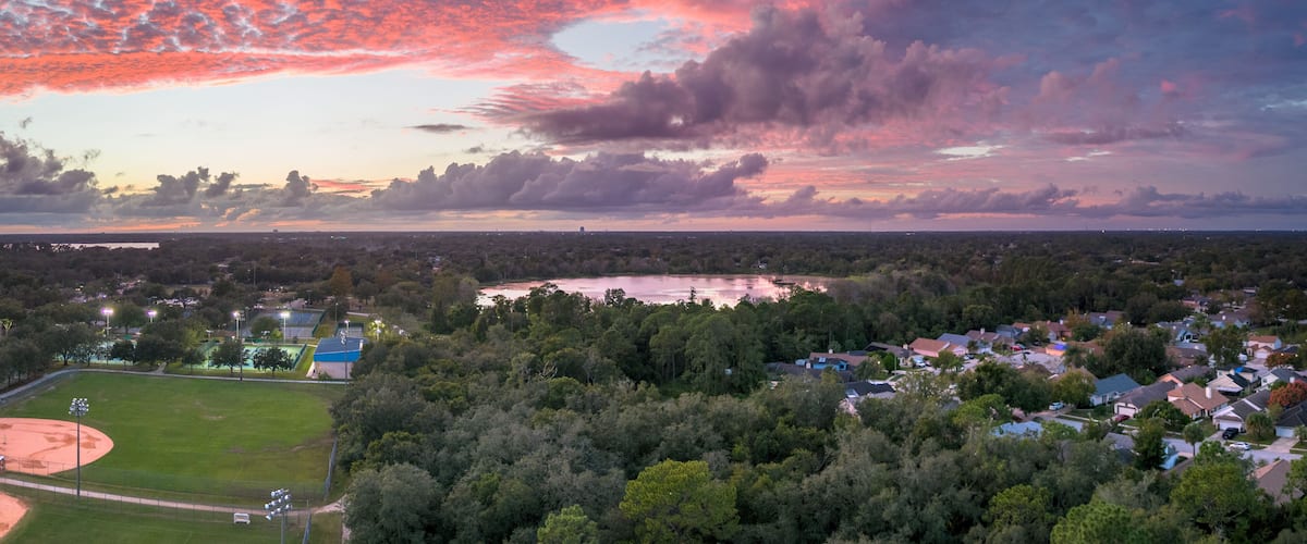 Aerial panoramic view of Red Bug Lake, Casselberry, Florida. October 29, 2022. High Dynamic Range (HDR) photo with natural sky color.