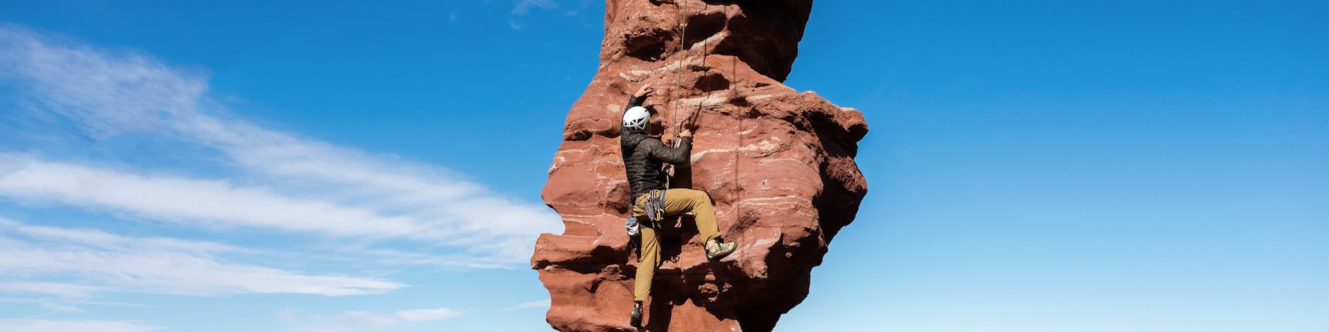 Rock Climber on Fisher Towers