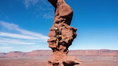 Rock Climber on Fisher Towers