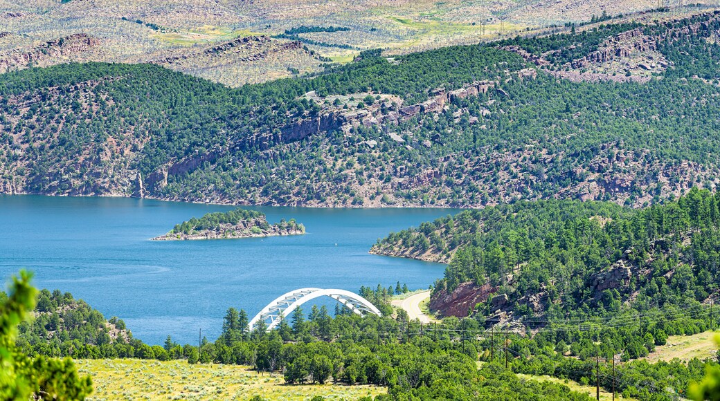 Dutch John, USA with Flaming Gorge Reservoir Bridge white color and blue lake river in summer in Utah National Park above high angle view