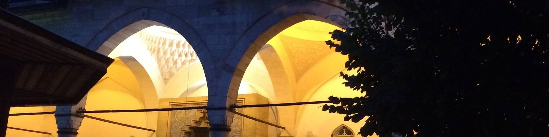 The Gazi Husrev-beg Mosque in Sarajevo at dusk. It is a tranquil break from the hustle of the rest of Old Town.
