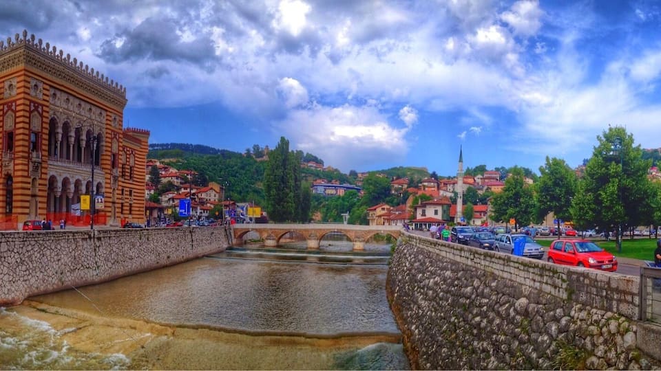 Vijećnica is located in the city of Sarajevo. It was designed in 1891 by the Czech architect Karel Pařík, but criticisms by the minister, Baron Benjamin Kallay, caused him to stop working on the project. It was initially the largest and most representative building of the Austro-Hungarian period in Sarajevo and served as the city hall. The building was reopened on the May 9, 2014.