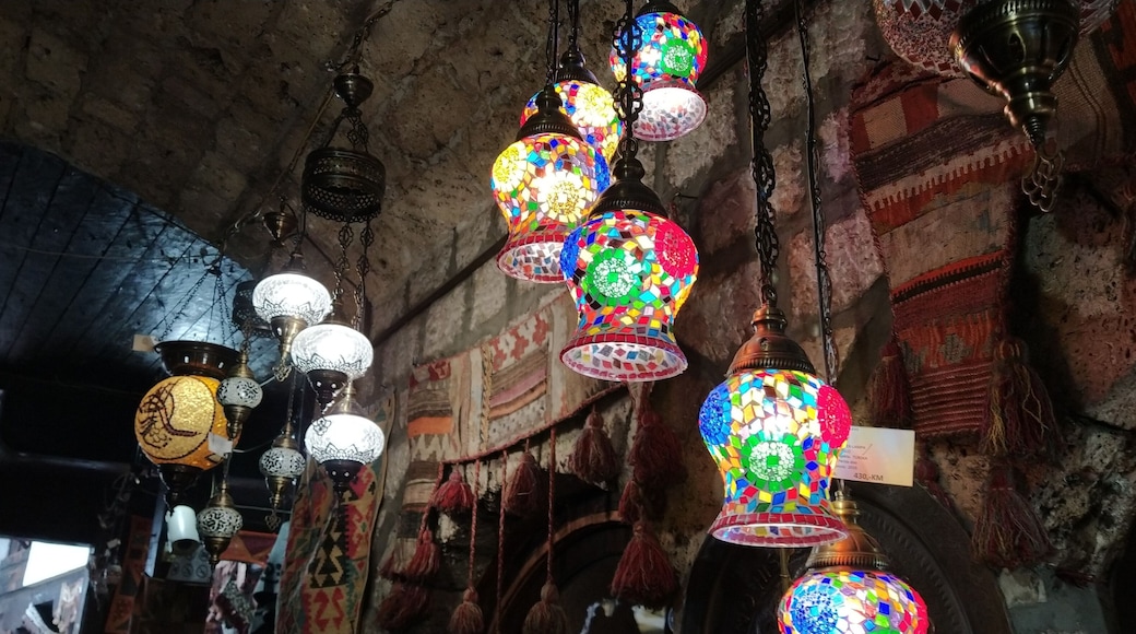 Traditional vintage Turkish lamps over light background in the night. Colored glass lamps and shades on the market in Sarajevo, Bosnia and Herzegovina. Sale of souvenirs in the market. Euro-trip