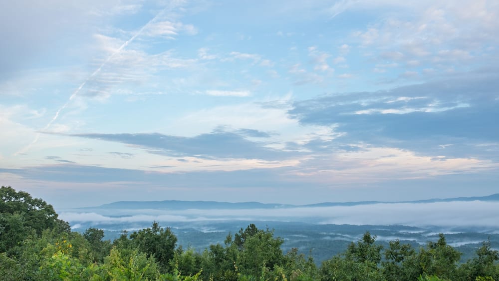 A summer morning look at the foggy hills and valleys near Heflin, Alabama, USA