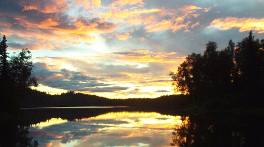 A vivid sunset over Lake Bulchitna caps the end of a fantastic day fishing and hiking.