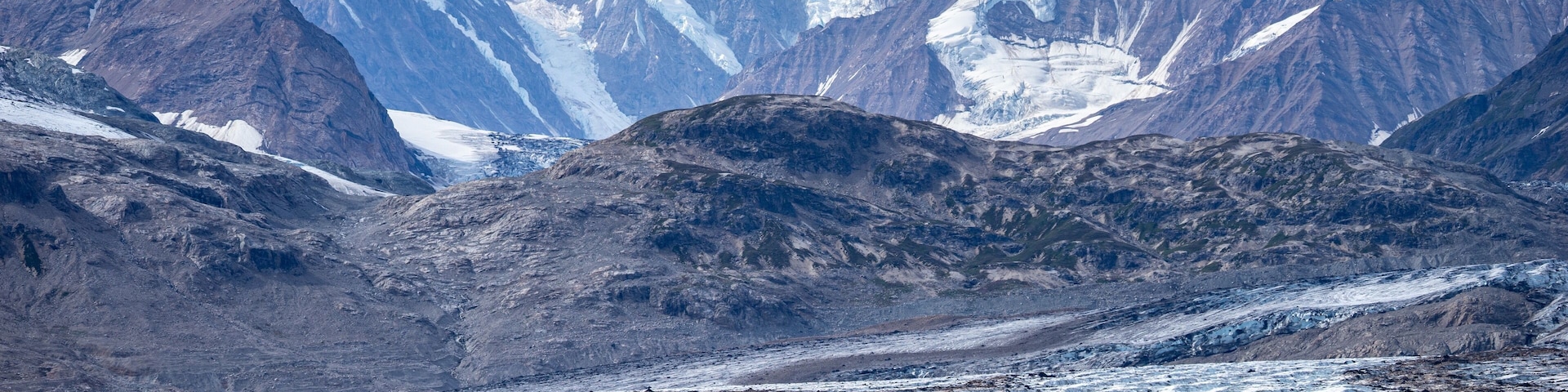Deep in the Tordrillo Mountains that top out of 12,000 feet hiking along a glacier that stretches over 20 miles long and over a 1000 feet deep