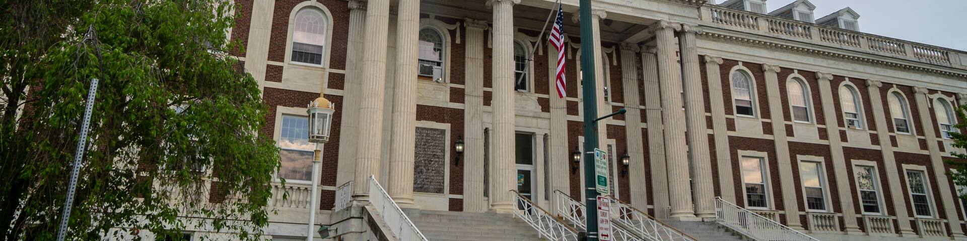 Schenectady, NY - USA - May 22, 2021: a landscape view of the Schenectady City Hall, an example of Federal-style architecture.