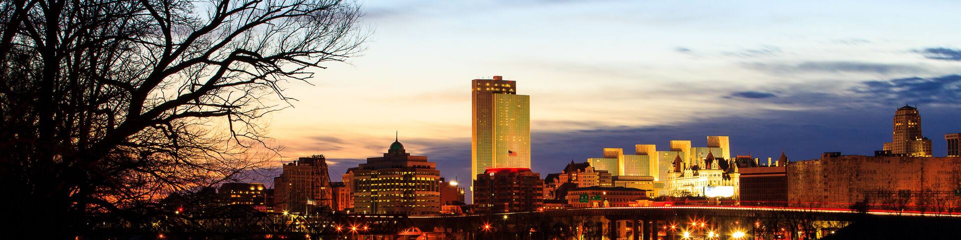 Albany NY skyline at night reflections off the Hudson River