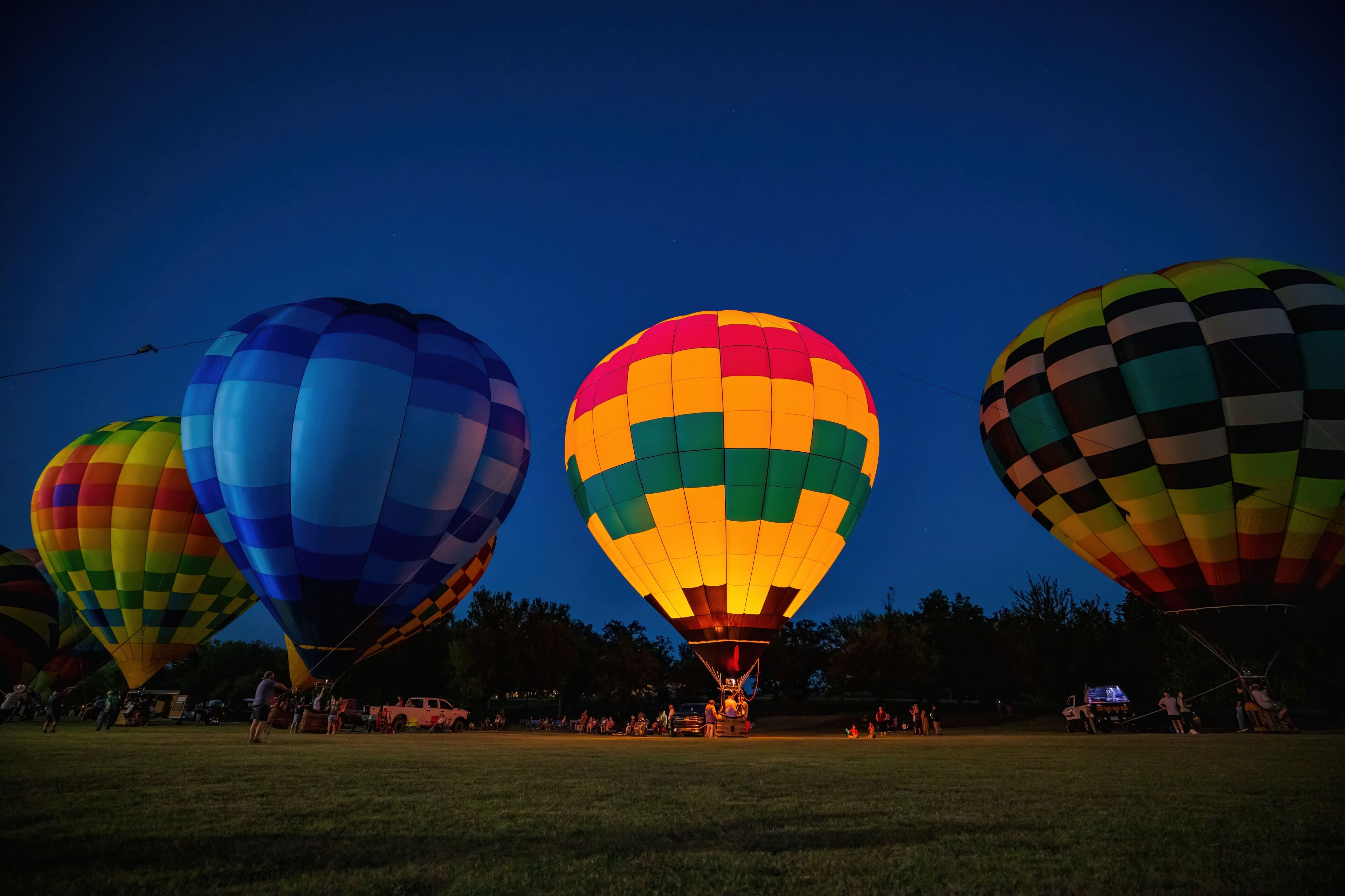 Night view of the Firelake Fireflight Balloon Festival event