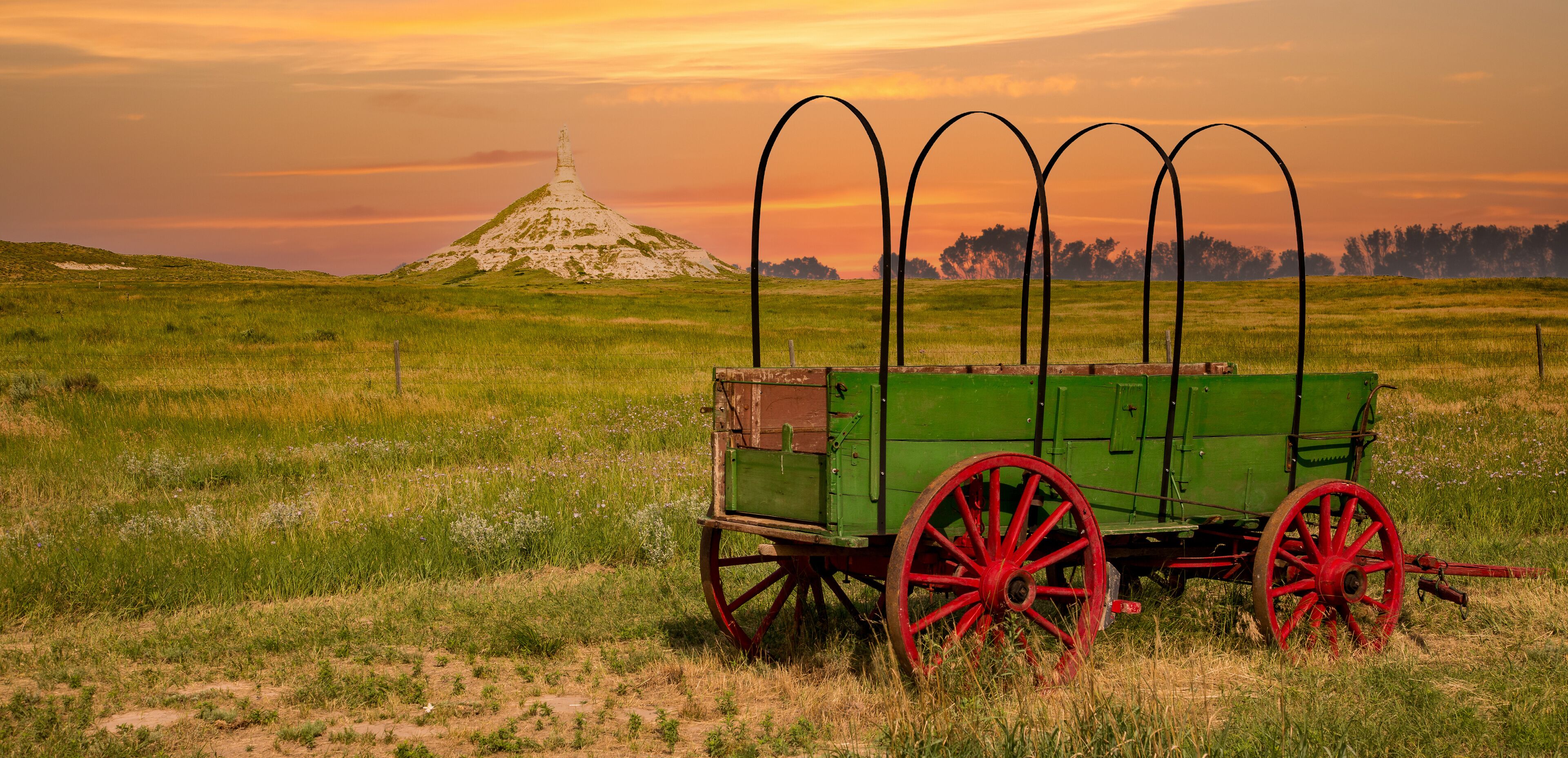 chimney rock national historic site.  It  is a prominent geological rock formation in western Nebraska, rising nearly 300 feet above the surrounding North Platte River valley