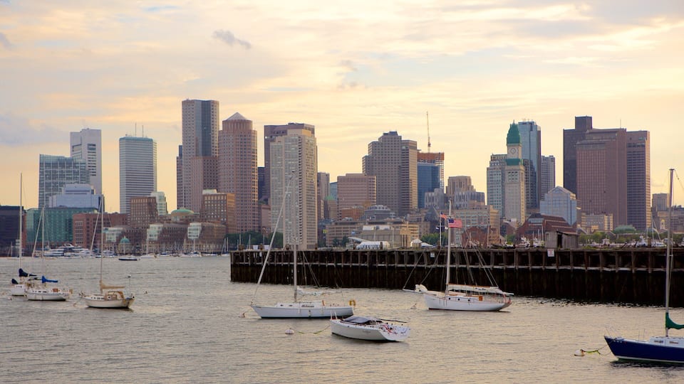 East Boston showing sailing, a city and a river or creek