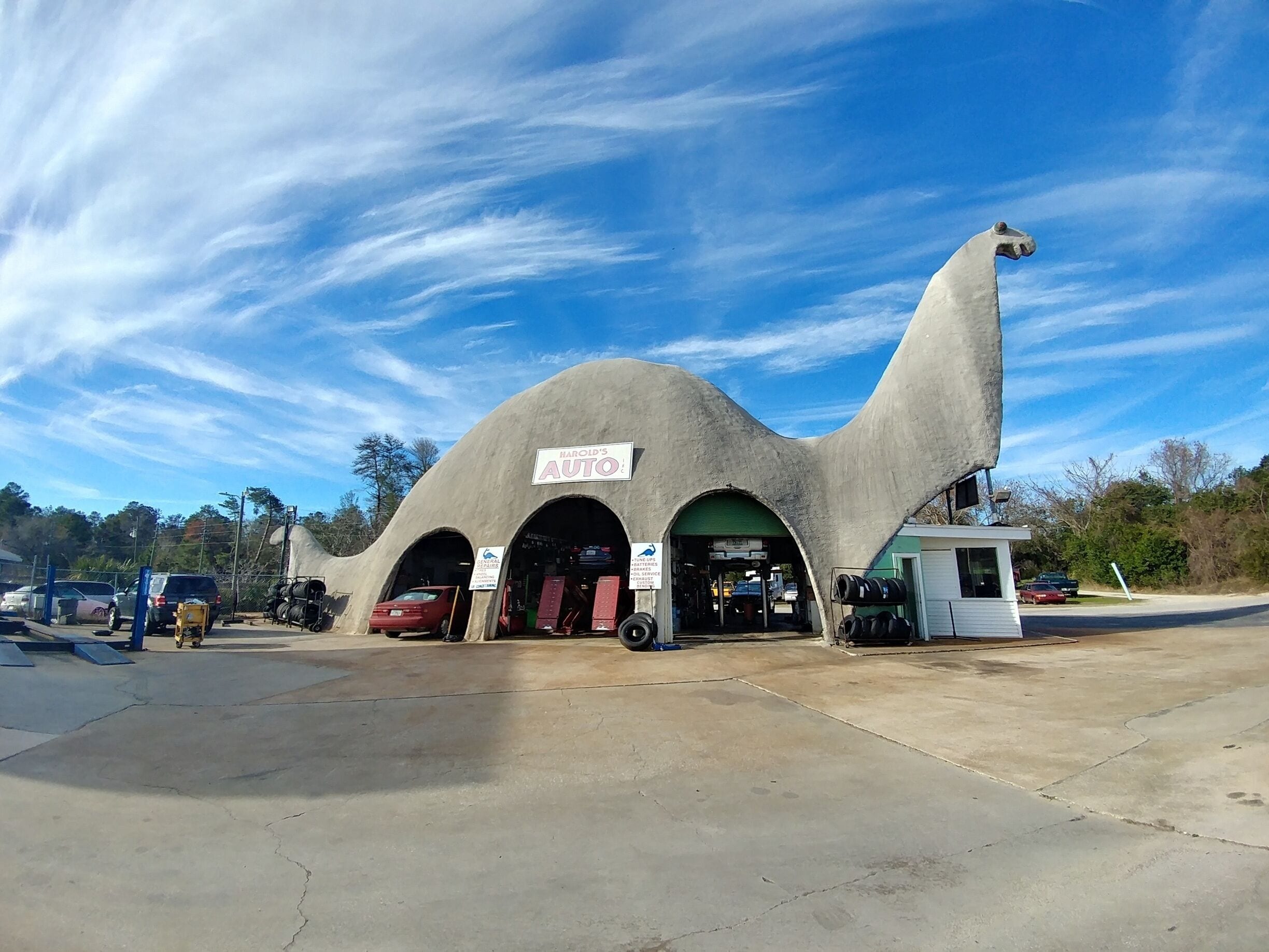 The Harold's Auto dinosaur was originally a Sinclair gas station in 1964, inspired by the Sinclair Oil mascot prominently featured in ads and on signs since 1930. The "Apatosaurus," stands 47 feet tall and is 110 feet long. 