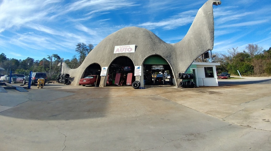 The Harold's Auto dinosaur was originally a Sinclair gas station in 1964, inspired by the Sinclair Oil mascot prominently featured in ads and on signs since 1930. The "Apatosaurus," stands 47 feet tall and is 110 feet long.