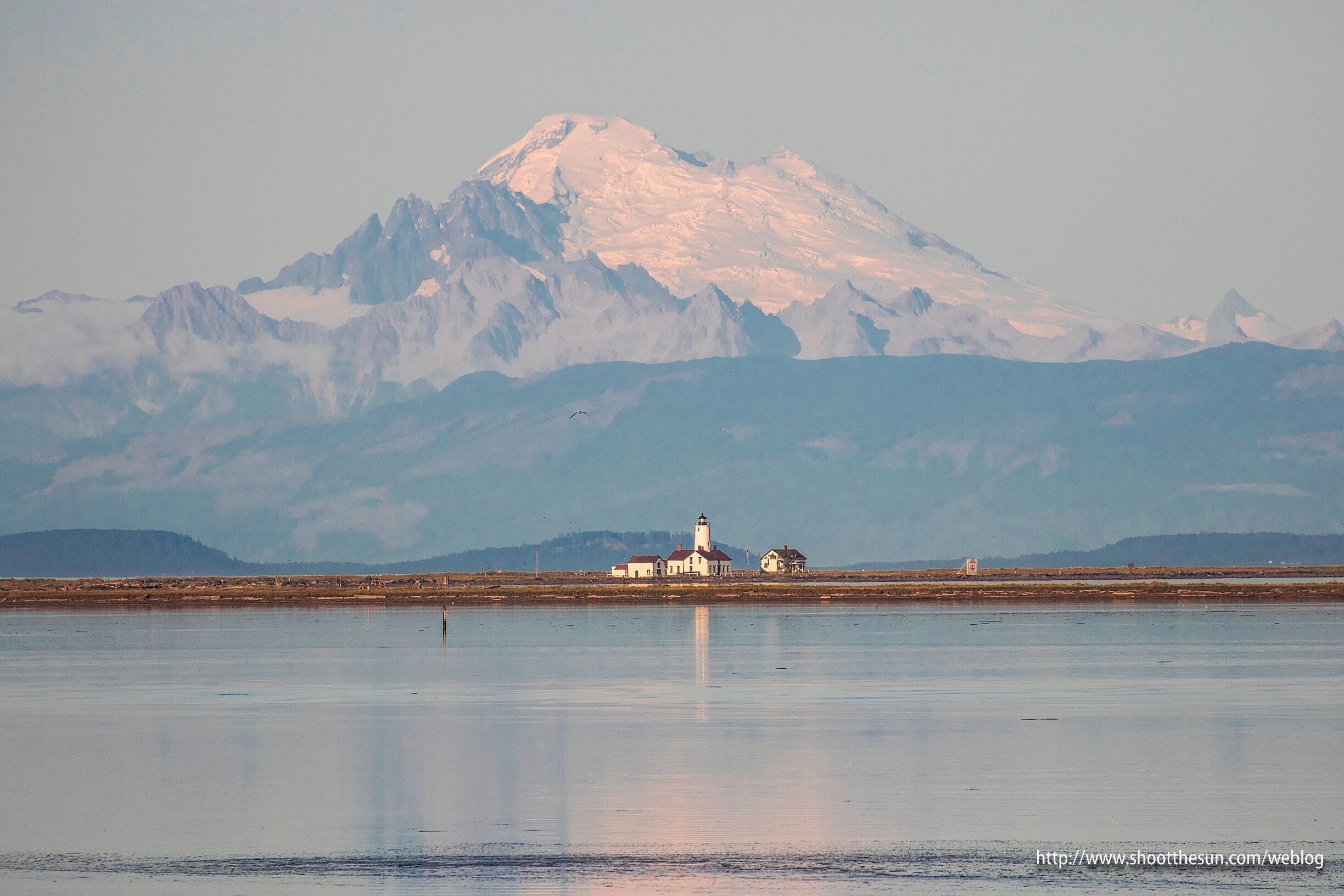 The lighthouse at Serenity Point, five miles away down the spit, with Mount Baker looming majestically in the background.

#BestOf5
