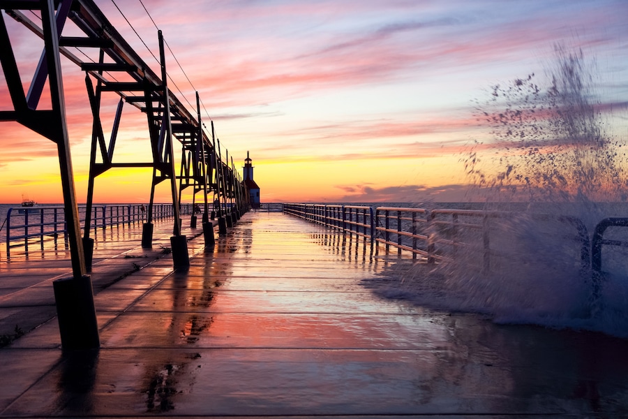 Lighthouse in Saint Joseph Michigan on a wavy summer evening at sunset