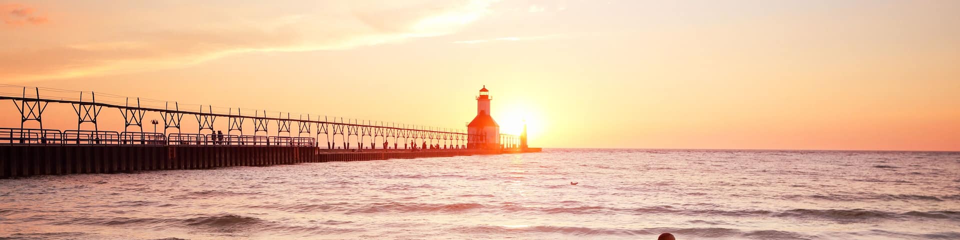 St Joseph Lighthouse on Lake Michigan at sunset