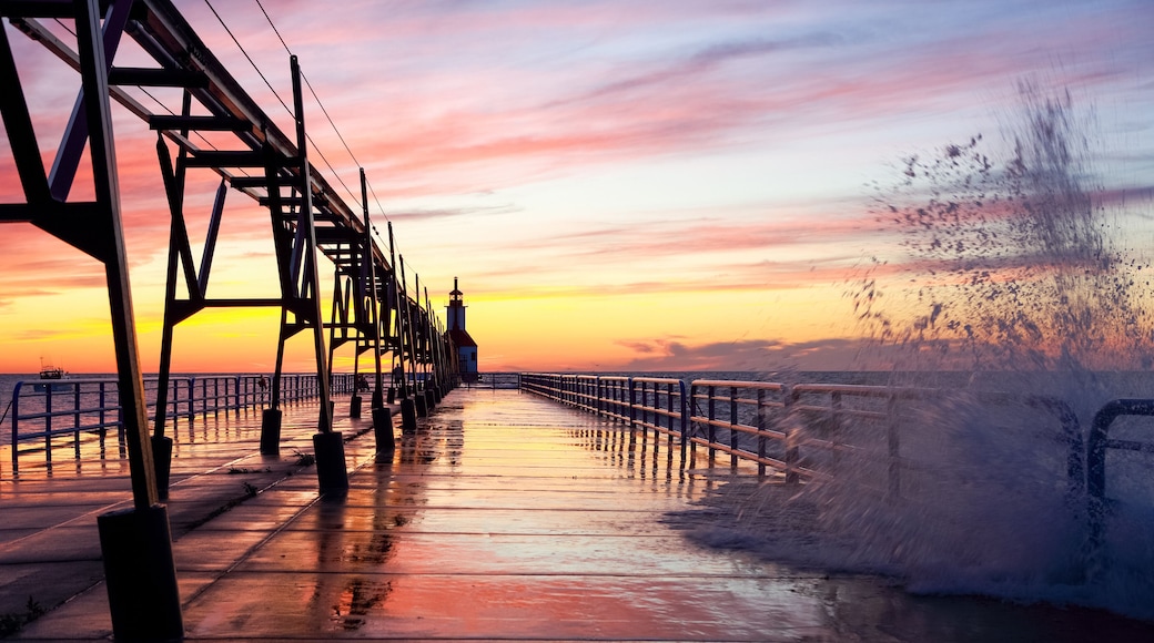 Lighthouse in Saint Joseph Michigan on a wavy summer evening at sunset