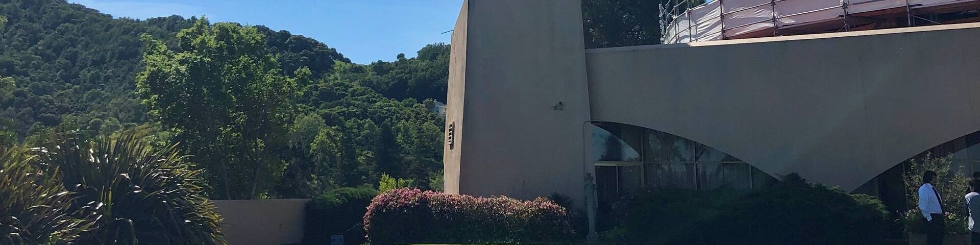Spire and fountain which are located in an outdoor space that is off the employee cafeteria area.