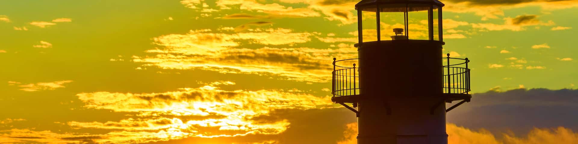 Aerial Tilt of Golden Hour Sunset Over St. Joseph Lighthouse