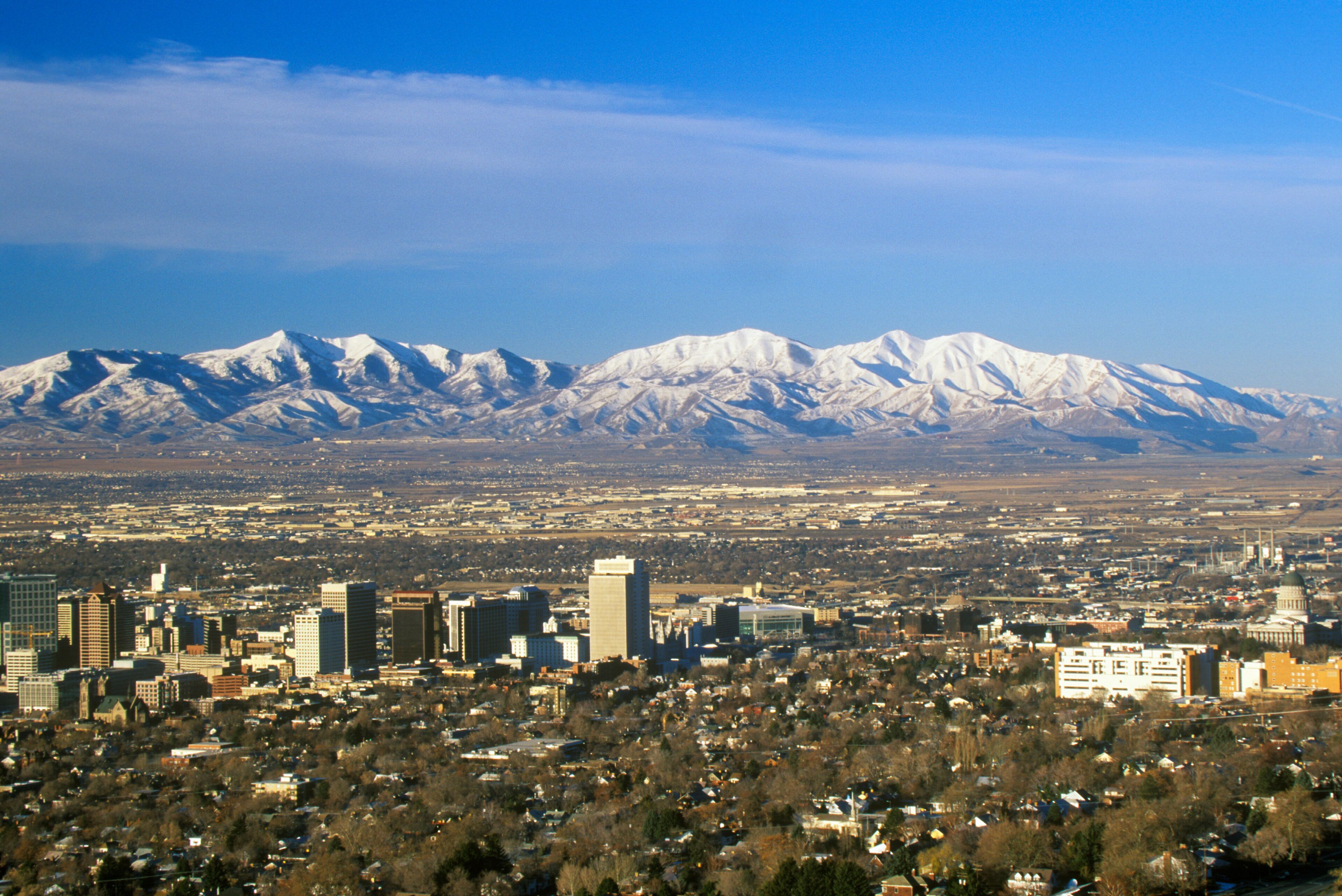 Skyline of Salt Lake City, UT with Snow capped Wasatch Mountains in background