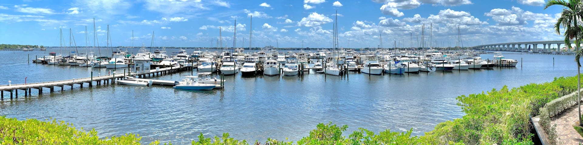 Boats docked at the harbor along the St Lucie intracoastal river in Stuart, Florida,