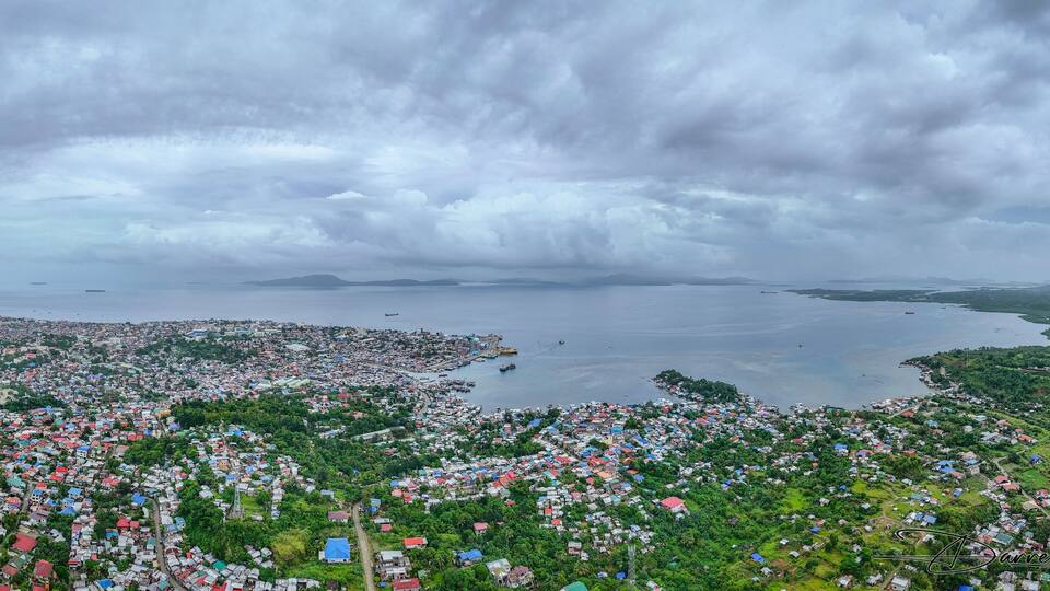 Surigao City looking towards Dinagat Island. Panoramic aerial view, Surigao Del Norte. Philippines.