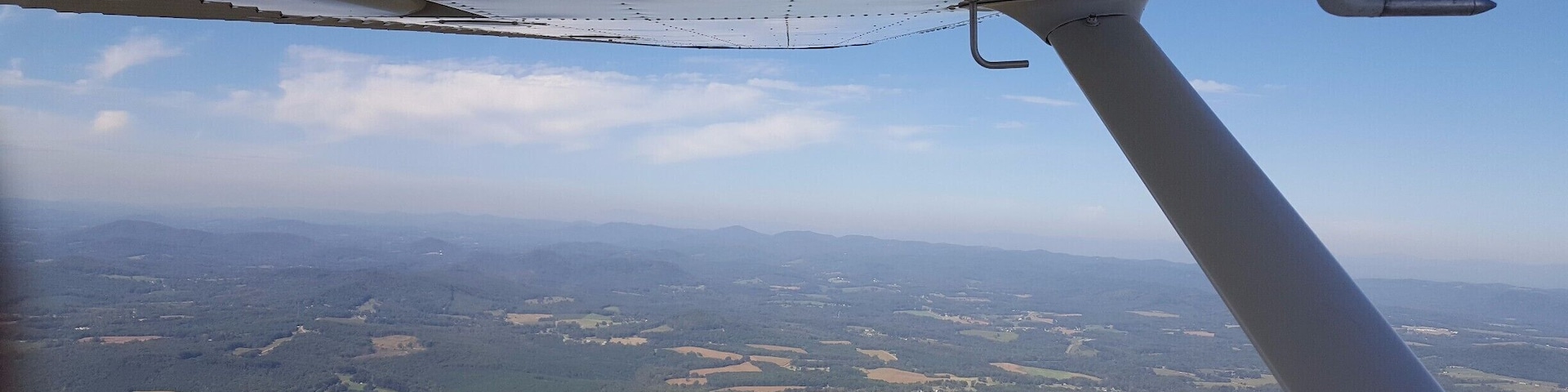 This photo is not of a singular place, but of a place, that is not normally talked about. I choose to take a picture of the most easterly mountains of Appalachian. The photo was taken 3250 feet in the air in a Cessna 150. The photo was taken with the purpose of showing that there are many various parts of the Appalachian community. Some people live near large mountain like Grand Father, but there are others that live next to small mountains like New Hope. It doesn’t matter how large the mountain is nearby, all that matter is they live near or on a mountain. They all are a part of the Appalachia society.
#appalachianechoes