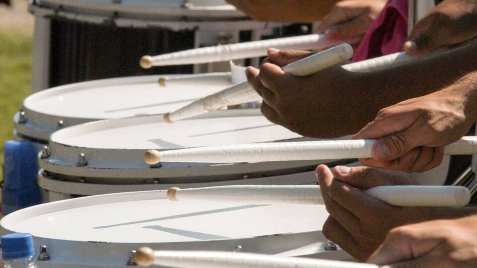 Percussionists during marching band rehearsal on football field, Stillwater, Oklahoma