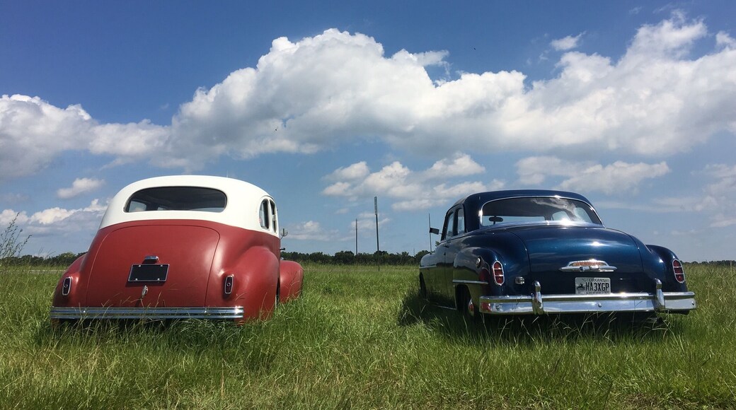 classic cars along the roadside