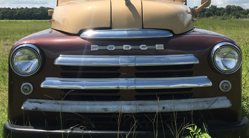classic cars along the roadside