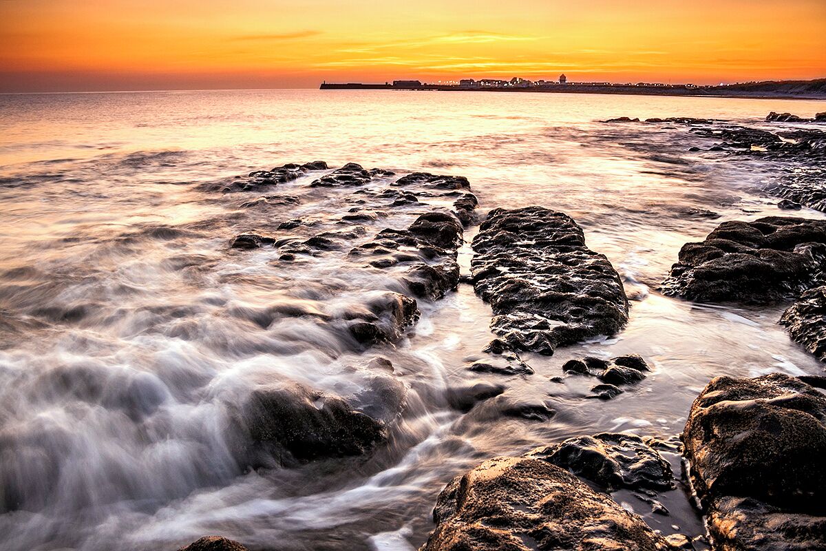 sunset in the rocky bay of Swansea, Wales
#waterlust
